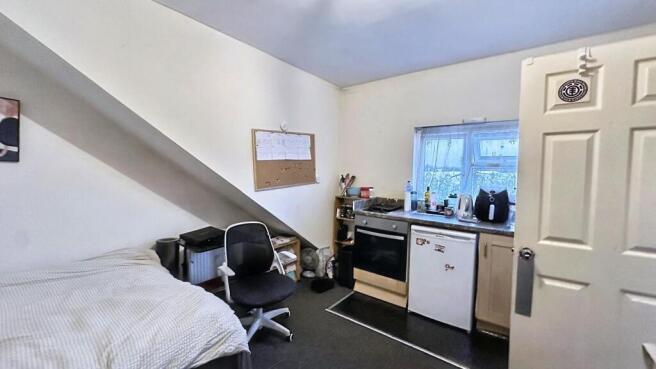 Bright studio space with modern appliances....