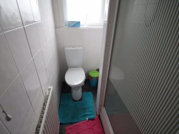 A clean and well-maintained bathroom featuring ...
