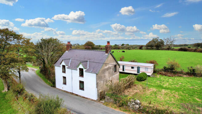 Side Elevation and Caravan