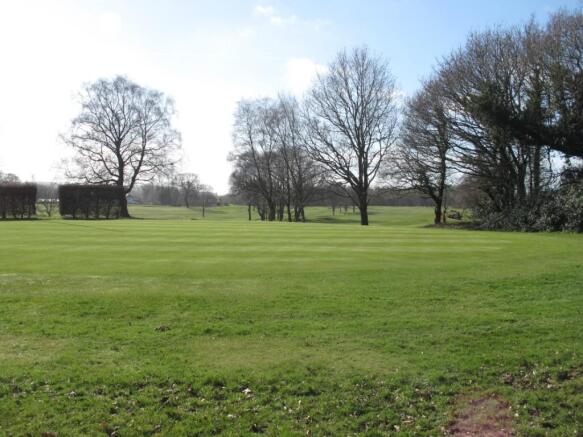 Golf course at rear