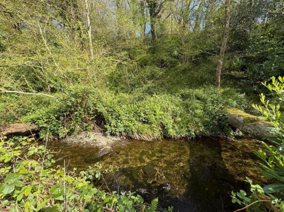 Stream to Side of House.JPEG