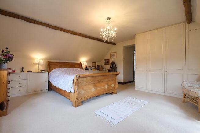 Bedroom 1 with ensuite bath and shower