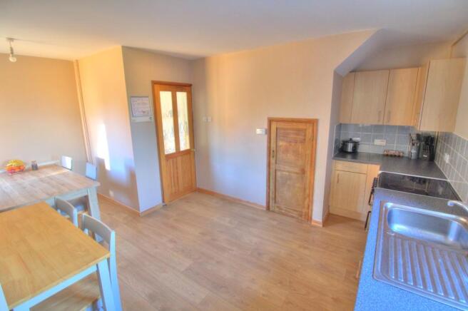 Kitchen/dining room photo two