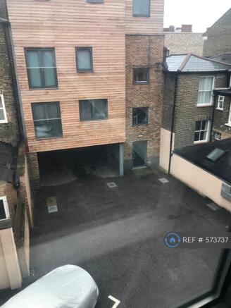 View From Balcony Over Private Car Park