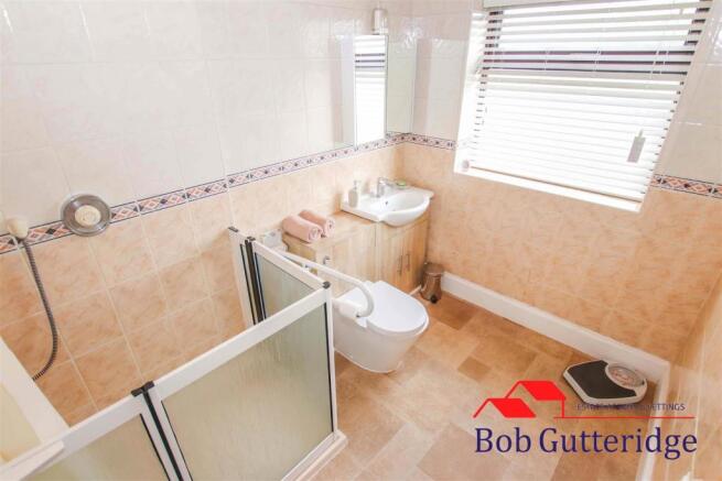 FIRST FLOOR FULLY TILED SHOWER ROOM