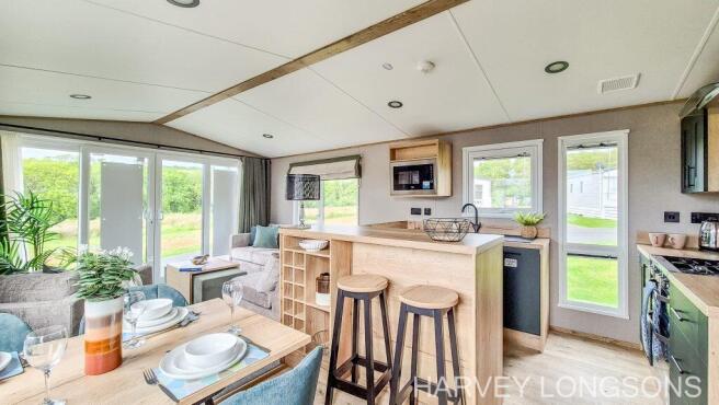Open-plan living, kitchen and dining area in ABI I