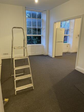 Bright, recently refreshed living area with lar...