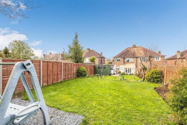 view down to garden to house