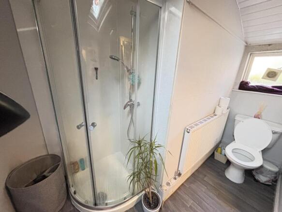 A clean and well-maintained bathroom featuring ...