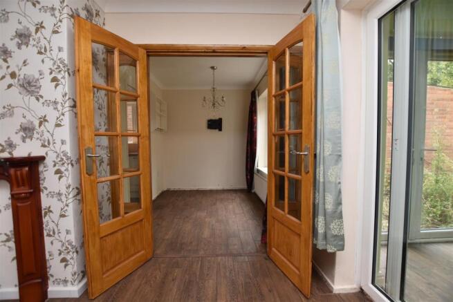 DOORS TO DINING ROOM