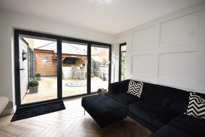 BI-FOLD DOORS TO COURTYARD GARDEN