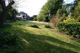 Rear View Of Property / Garden