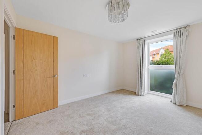 a room with a door and a window