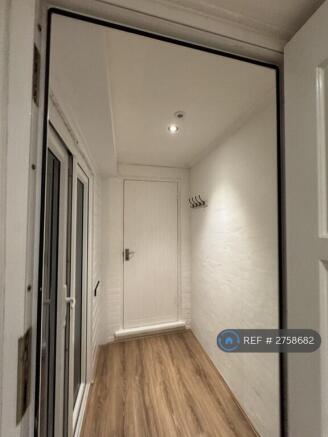 Entrance Hall With Storage Cupboard