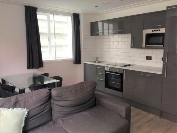 KITCHEN DINING LIVING AREA (2).jpg