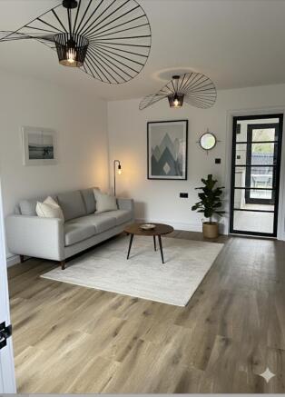 Image digitally staged to show potential layout.