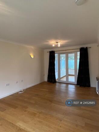 Alternate View Of Lounge Leading To Conservatory