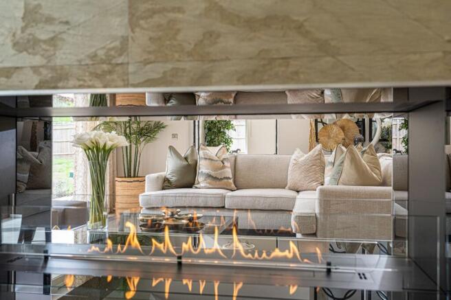 360 fireplace, view of lounge