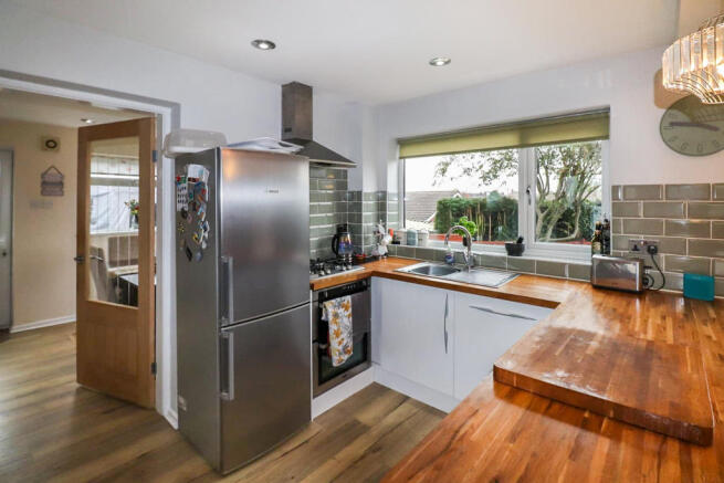 Kitchen flowing into the Ground Floor Room