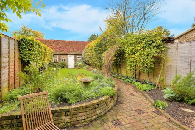 rear garden and double garage.jpg