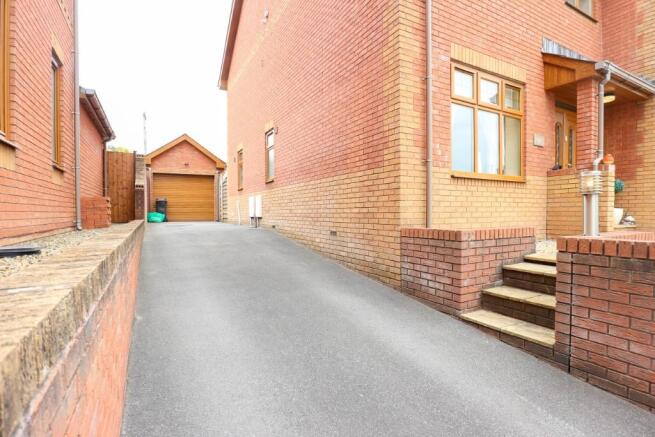 Side Drive to Garage