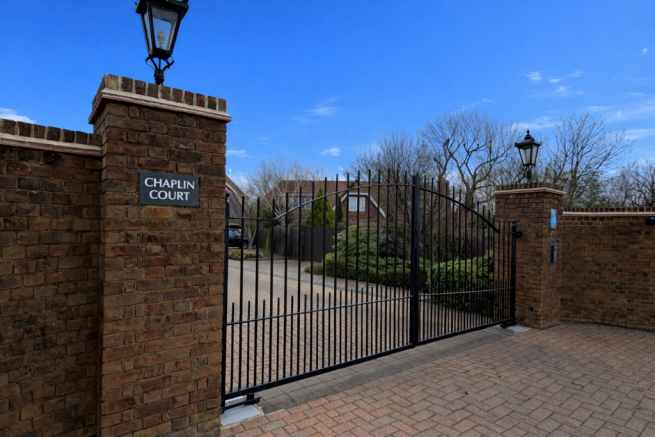 Chaplin Court front gates, presented by James Hill