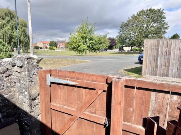 GATE TO VILLAGE GREEN
