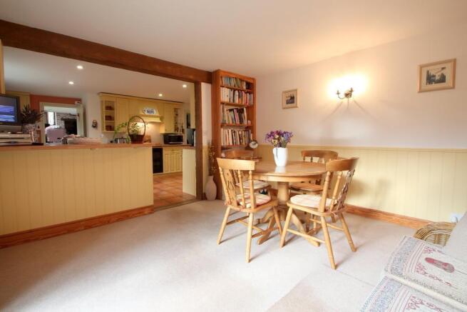 Breakfast room has doors onto patio