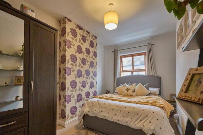 FRONT BEDROOM ONE