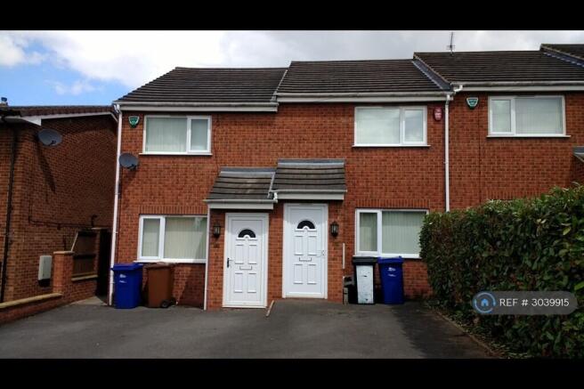 Front Of Property 2 Parking Spaces And Side Entry