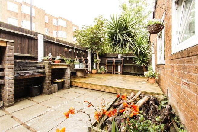 Private west facing front garden, BBQ and decking