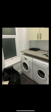 Bright utility space with laundry facilities...