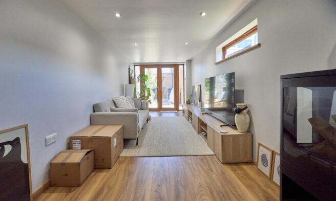 Extended through lounge/dining room to rear