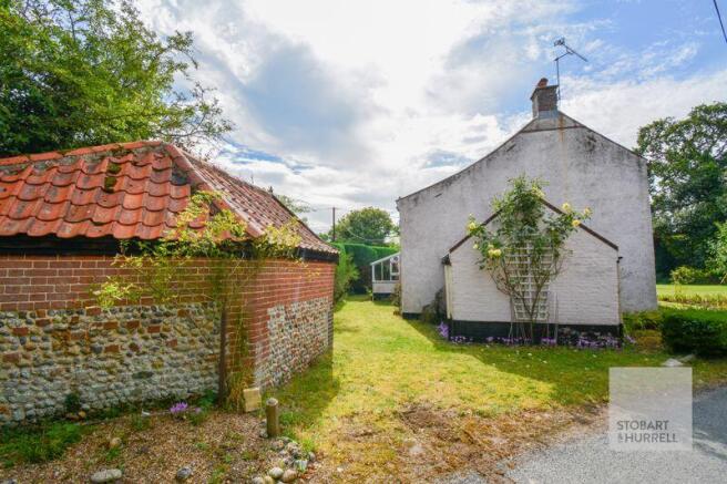 Side Aspect with Outbuildings 