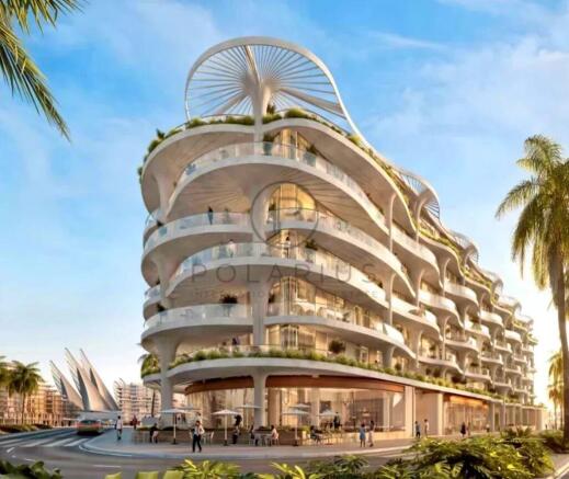 A modern, multi-story building with curved archite