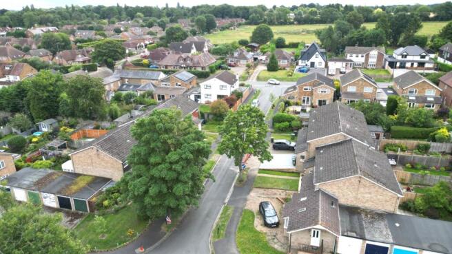 Aerial photo of approach in front of house