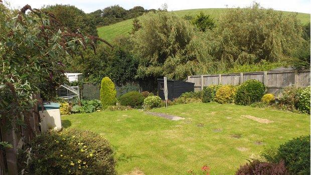 Lawn and rear aspect