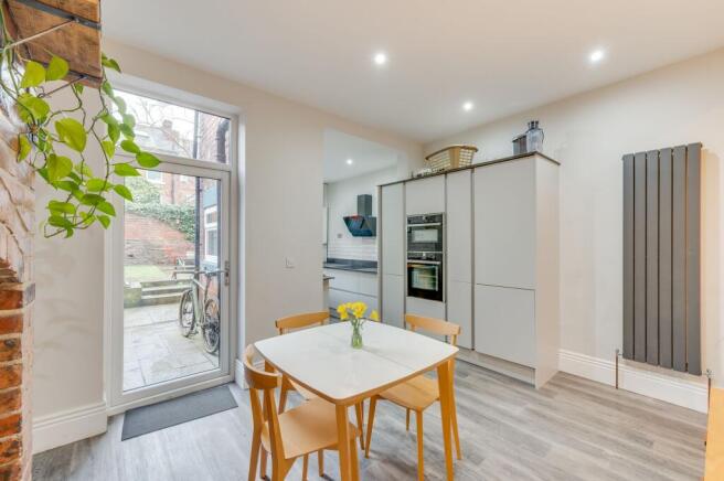 SITTING ROOM DINING ROOM AND KITCHEN