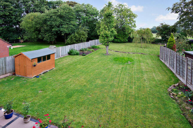 Rear Garden showing vegetable patch and shed.