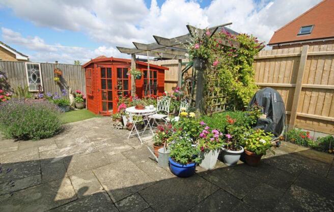 Rear garden with summerhouse