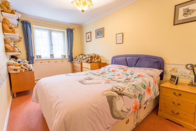 Bedroom 2 with wardrobes