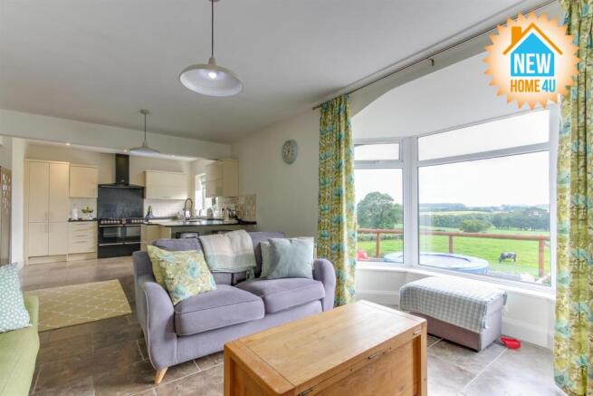 KITCHEN/DINING AREA/ FAMILY ROOM: