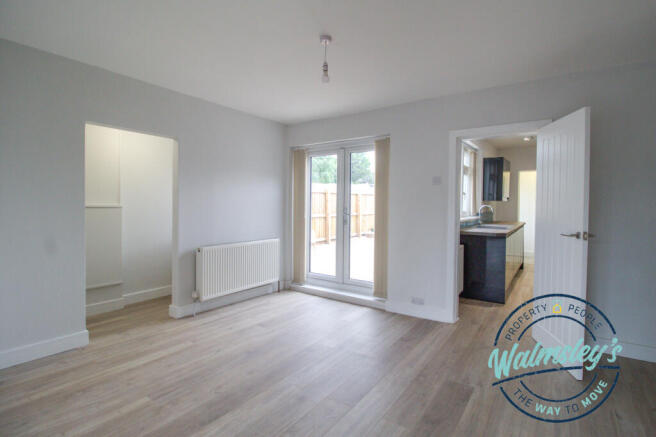 Rear reception room with French doors to gardens &