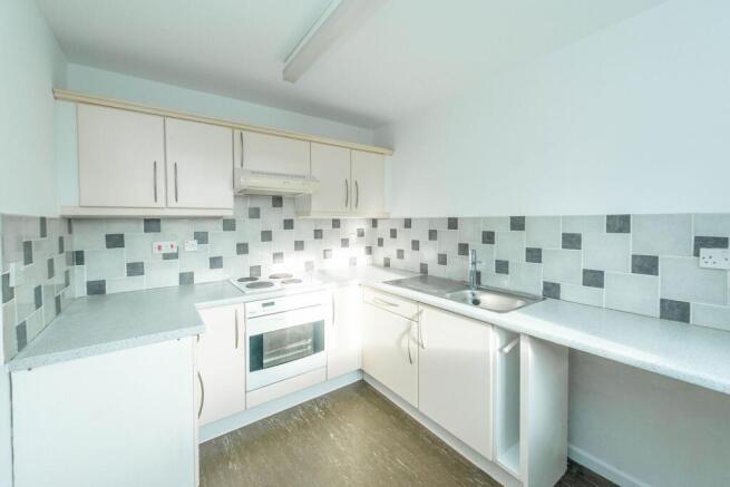 SITTING ROOM DINING AREA HALLWAY AND KITCHEN