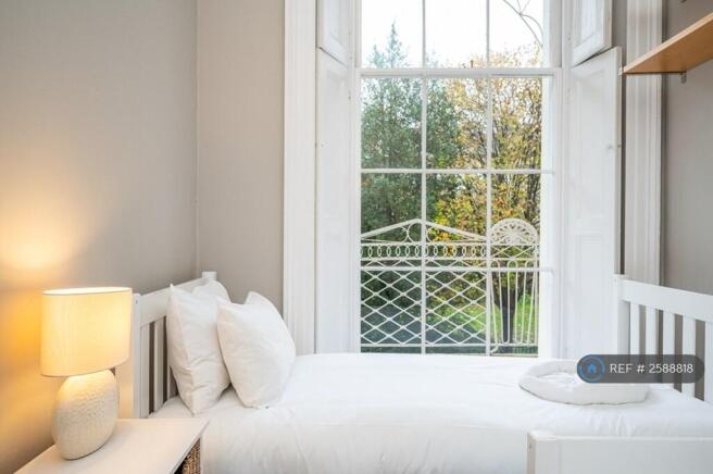 Master Bedroom With Balcony To The Rear