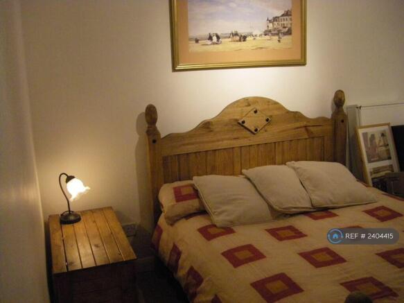 Bedroom With Furniture In