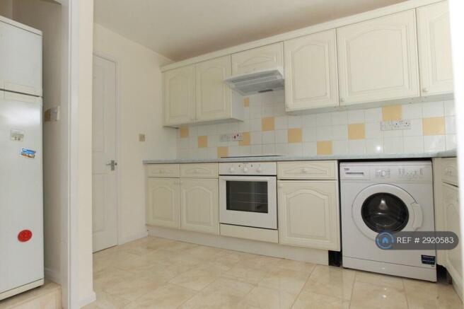 Spacious Kitchen From Hallway
