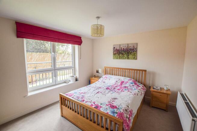 2 Riverbank Court - bedroom 1 (brochure).jpg