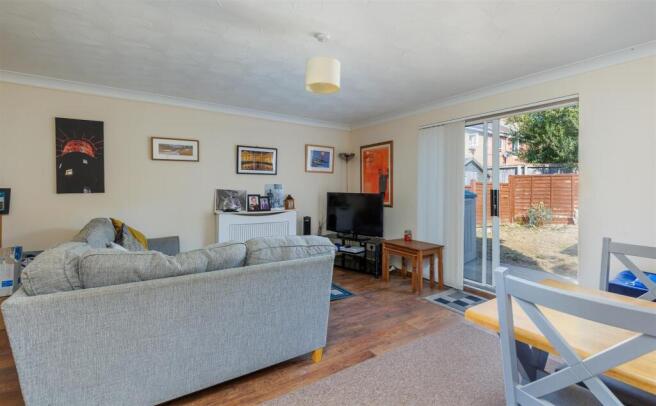 Sitting room with doors to garden