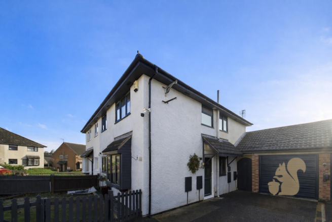 Sunny suburban semi-detached home.png